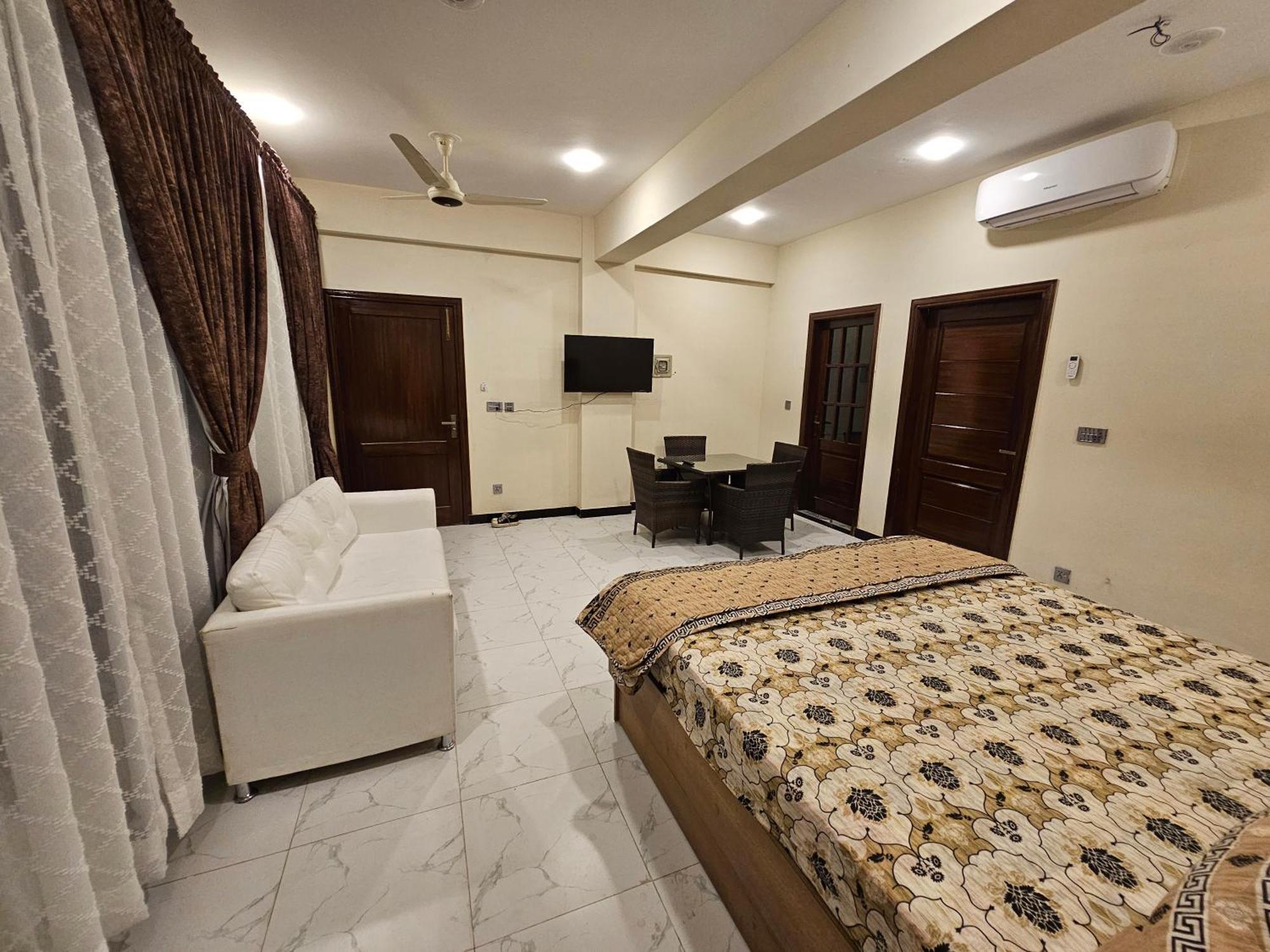 Motorway Majesty Suites Islamabad - Near Islamabad International Airport And Motorway חדר תמונה